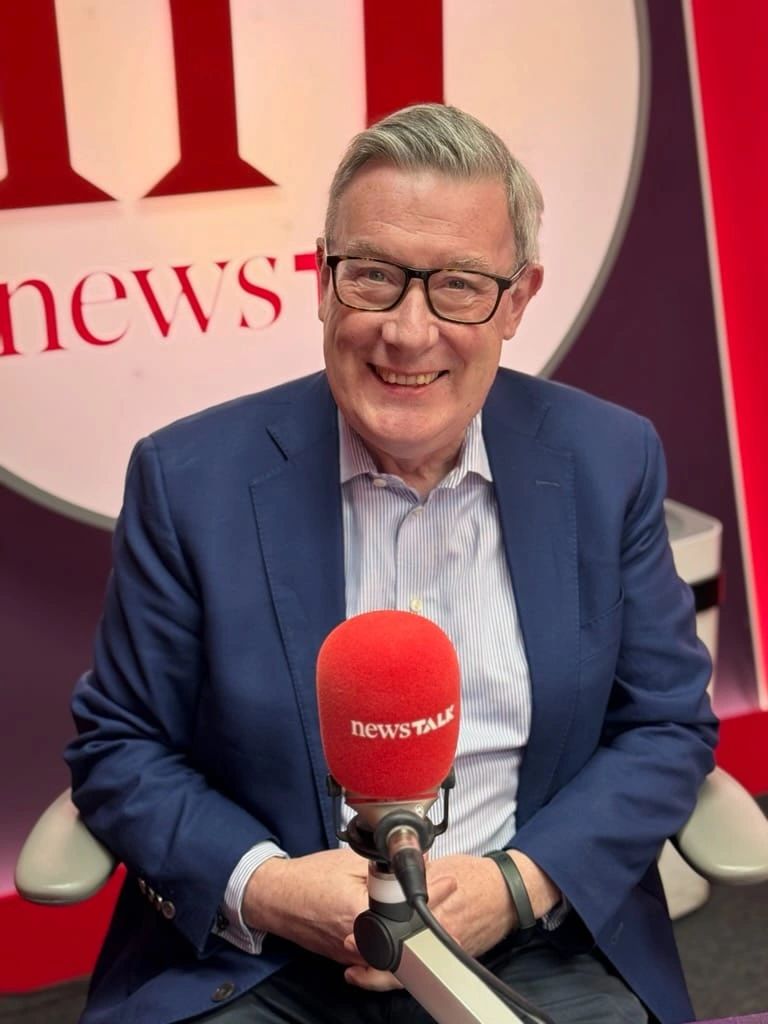 Kieran McLoughlin of Venturewave Capital at a Newstalk studio microphone